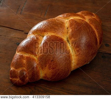 Easter Tsoureki Braid, Greek Easter Sweet Bread, On Wooden Background
