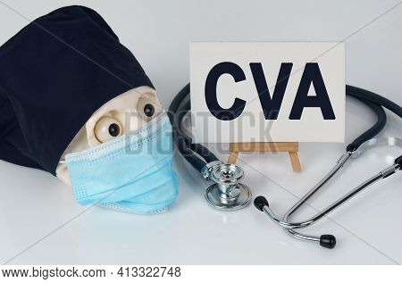 Medicine And Health Concept. On The Table Lies A Skull In A Mask And A Cap, A Stethoscope And An Eas