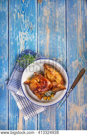 Chicken Quarters Baked On Plate. Top View.
