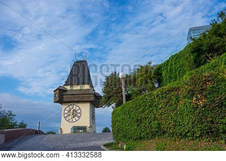 The Famous Clock Tower (grazer Uhrturm) And Gardens On Shlossberg Hill, Graz, Styria Region, Austria