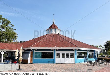 LONG BEACH, CALIFORNIA - 06 MAR 2020: Pelican Pier Pavilion, Shoreline Village at Rainbow Harbor, houses a carousel, video games, Skee-ball and Air Hockey.