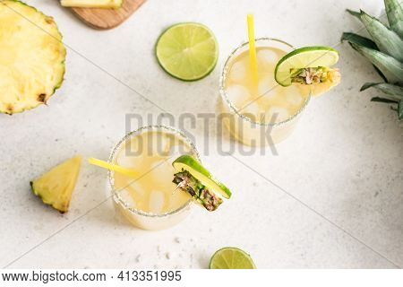 Pineapple Margarita Cocktail. Summer Boozy Refreshing Drink With Tequila, Pineapple In Glasses With 