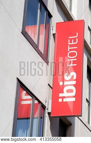 Bordeaux , Aquitaine France - 03 18 2021 : Ibis Hotel Text Sign And Brand Logo Re On Hostel  Wall Bu