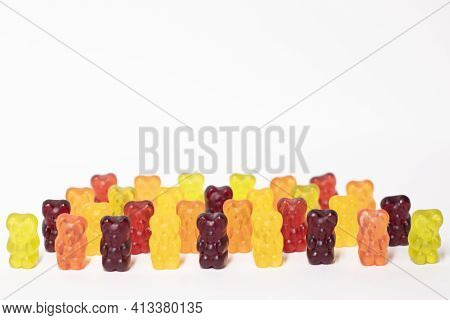 Colourful Sweet Gummy Bears Isolated On White Background.
