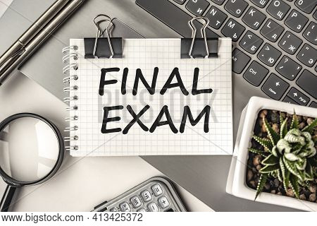 Final Exams Concept On Notepad And Laptop. Business, Financial Concept. Remote Training. Maths, Phys