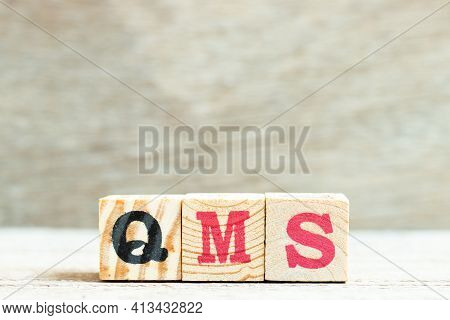 Alphabet Letter Block In Word Qms (abbreviation Of Quality Management System) On Wood Background