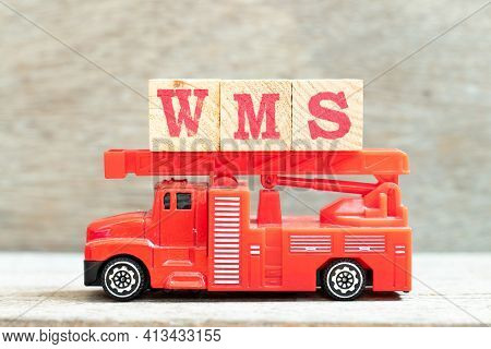 Fire Ladder Truck Hold Letter Block In Word Wms (abbreviation Of Warehouse Management System) On Woo