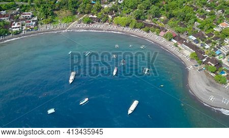 Aerial Drone Photo Of Jemeluk Beach And Beautiful Blue Lagoon With Anchored Speedboats. Traditional 