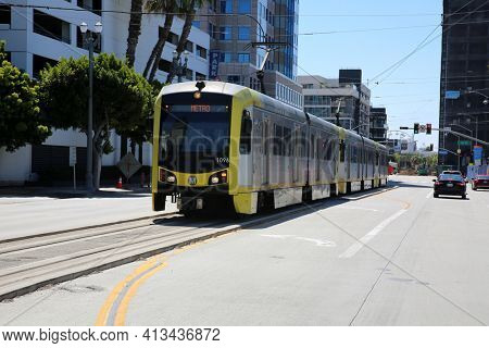 Long Beach, California - USA - March 15, 2021: Los Angeles Metro Blue Line in Downtown Long Beach California. Metrolink Train System transports people around in Southern California. Editorial use only