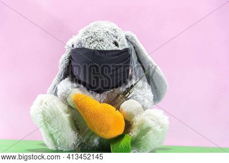 Plush Easter Rabbit Using Mask And Syringe To Fight The Covid-19