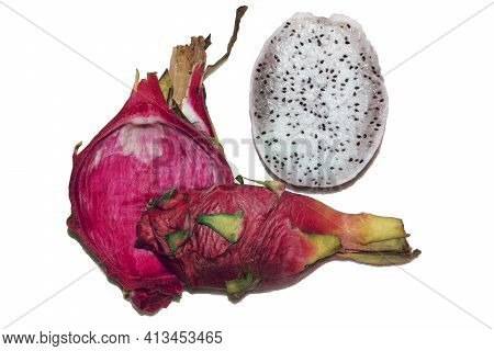 White Pitahaya Cut Into Pieces. Half Without Scaly Skin, A Whole Quarter Of Tropical Exotic Bright P