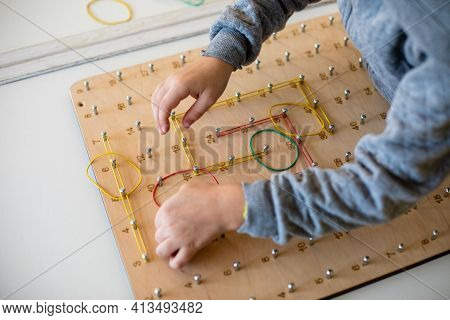 Exploring Basic Math And Geometry Concepts With Geoboard