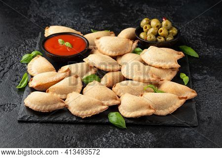 Margarita Margherita Pizza Parcels Pockets Filled With Tomato, Mozzarella Cheese And Basil Served On