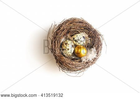 Golden Eggs In A Birds Nest On A Whight Background