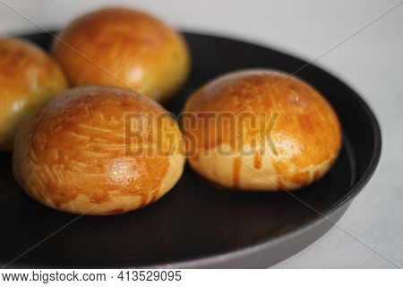 Glazing Gone Wrong While Baking Brioche Buns, A French Yeast Bread Enriched With Milk, Butter And Eg