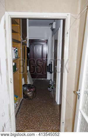 Antechamber Of An Old Run-down Flat In A Panel House With Door