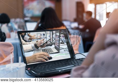 Asian Teacher Groups Computer Training Technology Or Coding Application In Smartphone With Laptop Fo