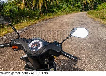 Siquijor, Philippines - February 8, 2018: Scooter On A Country Road On Siquijor Island, Philippine
