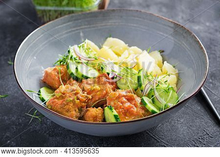 Steamed Fish Fillet With Tomatoes Sauce, Boiled Potatoes And Fresh Cucumber Salad. Diet Meal. Lenten