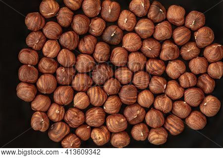 Hazelnuts Heap As A Background. Top View. Flat Lay. Hazel Nuts Pattern