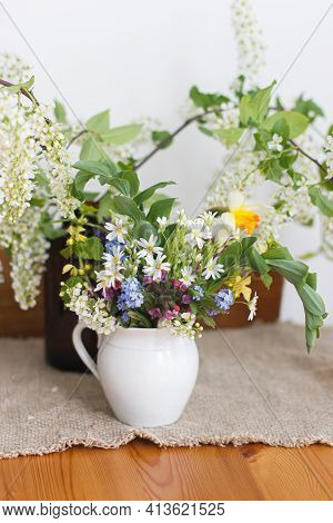Beautiful Spring Wildflowers On Rustic Wooden Table. Spring Rural Still Life. Blooming Flowers