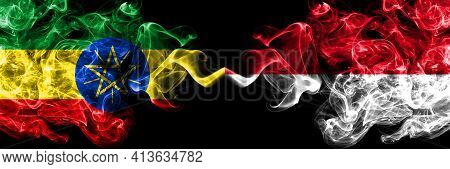 Ethiopia, Ethiopian Vs Monaco, Monacan Smoky Mystic Flags Placed Side By Side. Thick Colored Silky A