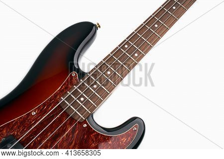 Metallic Volume Treble Guitar Bass Knobs. Electric Guitar. Red Electric Bass Guitar Close-up. Musica