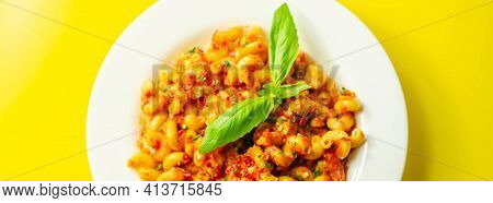 Cooked Cellentani Pasta With Cooked Chicken Breast And Peppers In A Spicy Tomato And Jalapeno Dressi