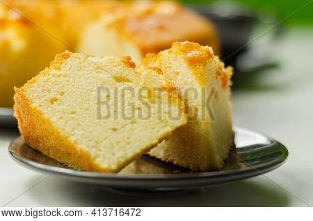 Portion Of Madeira Ring Loaf Cake Served On A Small Plate