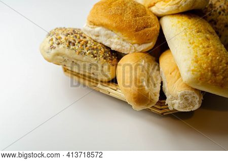 Various Types Of Bread Served On A Wicker Tray, Delicious And Fresh Rolls, Morning Food