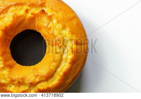 Freshly Made Madeira Ring Loaf Cake Decorated On White Background