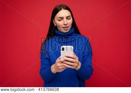Thoughtful Attractive Good Looking Young Brunette Woman Wearing Stylish Blue Warm Sweater Poising Is