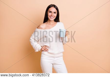 Photo Of Young Cheerful Girl Happy Positive Smile Hold Cup Of Hot Tea Enjoy Break Isolated Over Beig