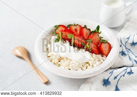 Cottage Cheese, Curd Cheese With Strawberries Berries In A Bowl, Ogranic Homemade Dairy Product. Hea