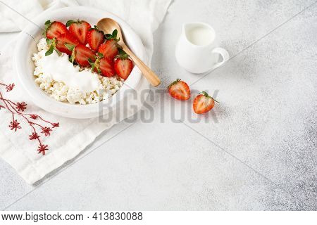 Cottage Cheese, Curd Cheese With Strawberries Berries In A Bowl, Ogranic Homemade Dairy Product. Hea