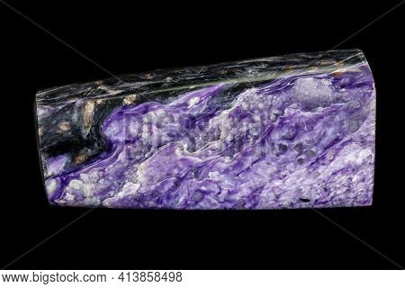 Macro Stone Charoite Mineral On A Black Background Close Up