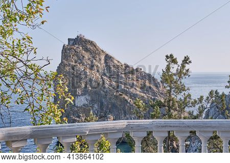 Rock Diva, The Black Sea Coast Near Yalta, Crimea. People Walk On The Suspension Bridge, Climb To Th