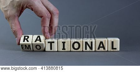 Rational Or Emotional Symbol. Psychologist Turns Wooden Cubes And Changed The Word 'rational' To 'em