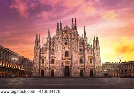 Milan, Italy - March 2021: Milan Cathedral (duomo Di Milano) At Sunrise, With Red And Orange Sky Dur