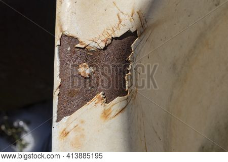 Street Lighting. The Old Cast-iron Tub Is All Ruined And Covered In Rust. Enamel Peeled Off