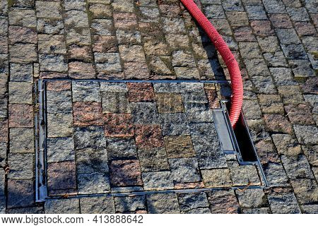 Hatch For Storing Drawers And Water Inlets For Watering And Placement Of Market Stalls In The Square