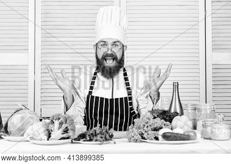 Vegetarian Salad With Fresh Vegetables. Healthy Food Cooking. Mature Hipster With Beard. Happy Beard