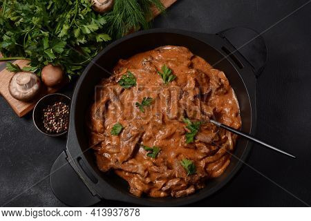 Beef Stroganoff With Cremini And Champignons On A Frying Pan.