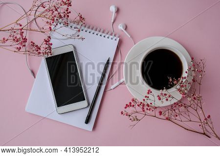 Open Blank Notebook With Headphones Mobile Phone. Black Screen. Copy Space For Text. Top View. Dry P