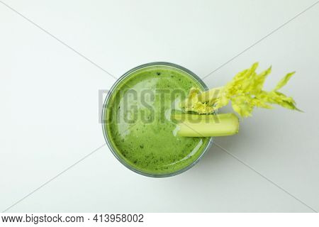 Glass Of Green Smoothie With сelery On White Background