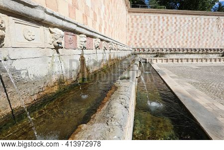 Ancient Fountain In The Italian City L Aquila Called 99 Cannelle Which Means Ninety-nine Small Straw