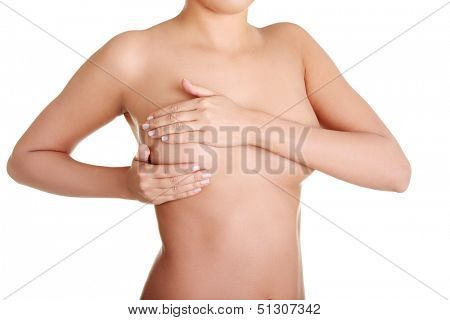 Woman examining breast mastopathy or cancer. Isolated on white