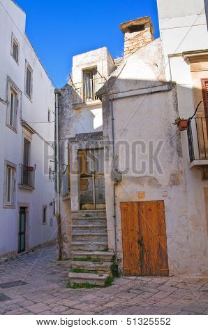 Alleyway in Noci. Puglia, Italy.
