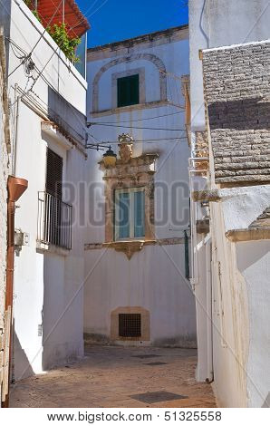 Alleyway in Noci. Puglia, Italy.