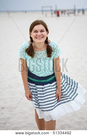 Young Happy Woman On The Beach Of St.peter Ording, North Sea,